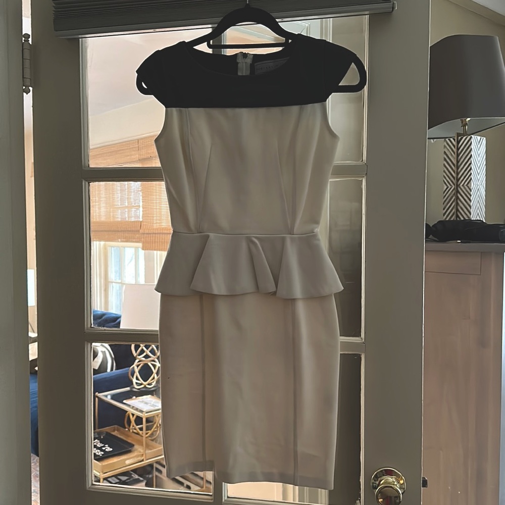Madison Kinney white peplum dress with faux leather trim